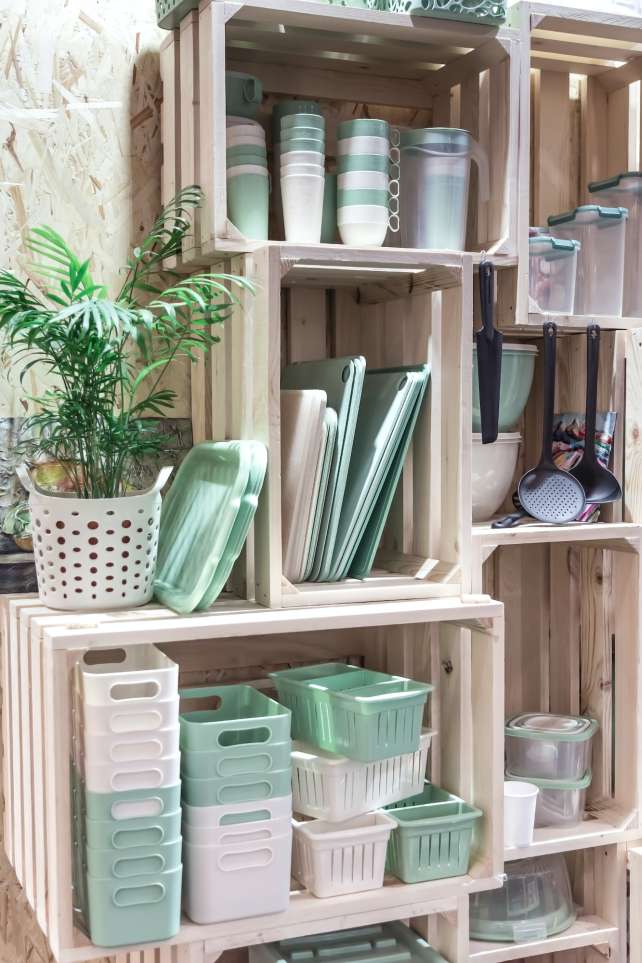 Organization of Storage and Home Space in a Loft Style. Storage Boxes on Shelves
