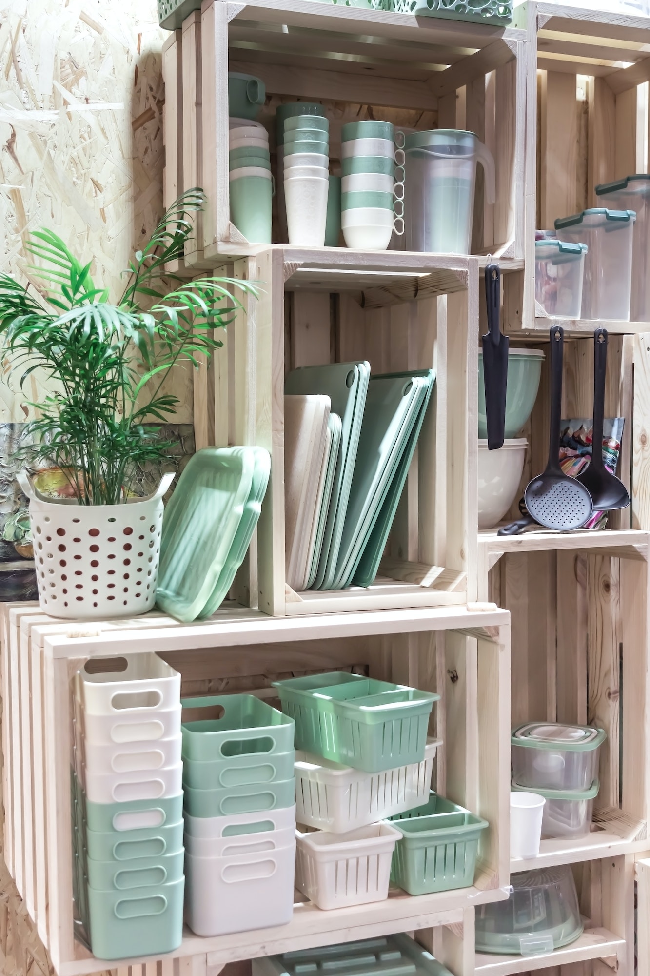 Organization of Storage and Home Space in a Loft Style. Storage Boxes on Shelves